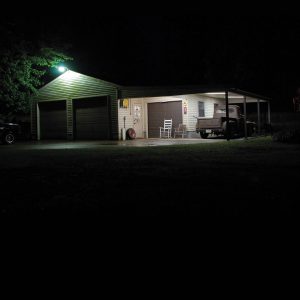 The two doors on the left are shop doors while the door on the right is the “clean space” reserved for Bobby Cullipher’s very cool ’36 Ford roadster. The red-primered F-1 is a genuine parts chaser and Bobby’s daily driver. It is parked under the carport so that it’s ready at a moment’s notice. And, of course, now that Bobby’s retired, that rocking chair will come in handy.