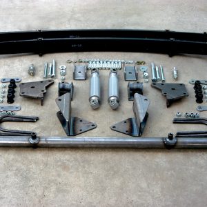 The rear suspension kit is available from a number of aftermarket companies for a number of applications, especially those specializing in early Chevy pickups and panel trucks. This kit typically came with a pair of leaf springs, two shock absorbers, spring brackets, spring plates, U-bolts, a shock absorber crossmember, hardware and a comprehensive instruction sheet.