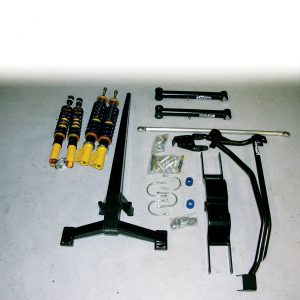 The upper control arms on a stock SN95 rear suspension must perform two jobs at once: centering the rear axle and preventing axle windup. When driven hard, the design begins to show its limitations and that it’s not the best design for the job. There are many different suspensions available to replace the stock setup, and one of the most interesting is the torque arm setup from Maximum Motorsports.