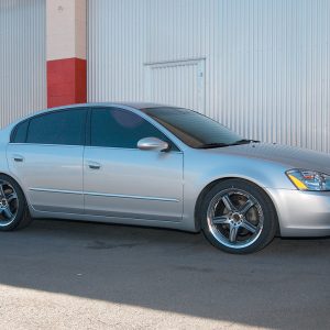 With only two hours involved for the complete installation, the Nissan Altima now sits 2 inches lower and successfully rids the car of the nasty unwanted tire gap. It is recommended that after you drive the car for about a week, have a professional alignment shop check and readjust the alignment at the “set” new ride height. This will ensure better tracking and handling and you won’t prematurely wear through your new upgraded tires. 