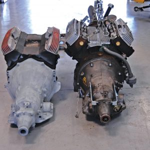 On the left, we can see the Turbo 350 GM transmission in its natural environment, attached to a small-block Chevy engine. On the right is the shortened and modified 350 Turbo attached to Gary Moore’s early Olds engine. Tanson Enterprises handled the modifications. 