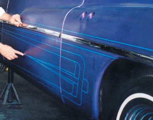 Once the design is finalized, go around the entire pattern carefully pressing down the tape lines to ensure a nice, crisp line. Be certain your hands are clean and oil free during this process.