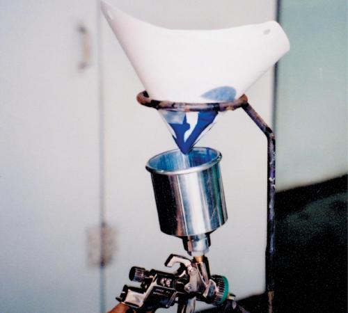 Always use paint strainers when pouring paint into spray guns and mixing cups.
