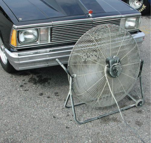 There are lots of ways to cool an engine at the drags. Ice on the intake manifold is one way. So is a huge electric fan. We spotted this set-up at the Francis Butler Shootout last summer. You’ll need 120V electricity, either from the track or through an inverter that converts vehicle 12V to household 120V.