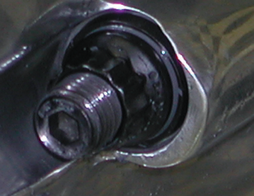 Why block studs? Some engine bolts are only good for one torque-down. Upon removal, they cannot be re-torqued. Traditional head bolts can be re-torqued, but if you continually use them, they will stretch. When they do, they often pull out the top block threads, or worse. In the worse condition, a heli-coil must be installed. Also it is recommended to chamfer the top threads, thus eliminating a raised deck surface. It is recommended to use top-quality block studs for heads and main caps, but be certain you can remove the heads with the engine installed, just in case. 