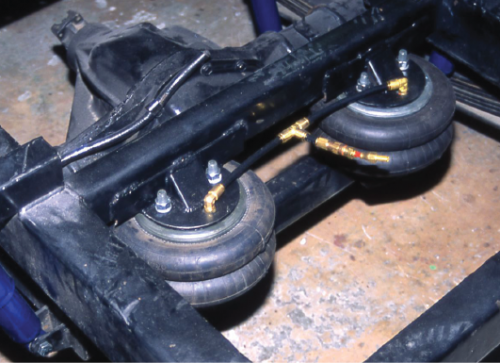 If you are looking to install an airbag rear suspension, we saw this setup and thought you’d like to see it too. It has lowering blocks and the airbags offer about 8-9 inches of travel. 