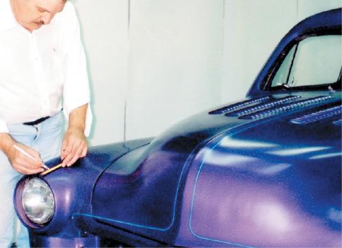 Use a simple tape measure to make some more reference marks. Make small, faint dots with a contrasting-colored chalk or charcoal pencil. In the case of the Knight Cruiser, we used white chalk. Once the reference points have fulfilled their purpose, remove them and all residue with a slightly dampened, new, soft, lint-free cloth. Avoid future problems by never using an old shop towel.